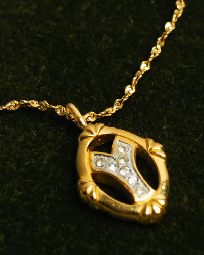 "Yves Saint Laurent" 80's-90's Gold tone rhinestone pendant necklace