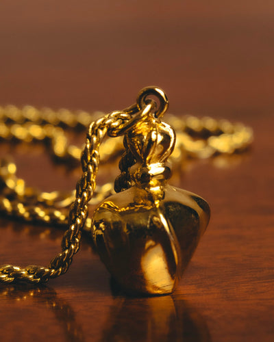 "Christian Dior" 80's-90's Gold tone bottle pendant necklace