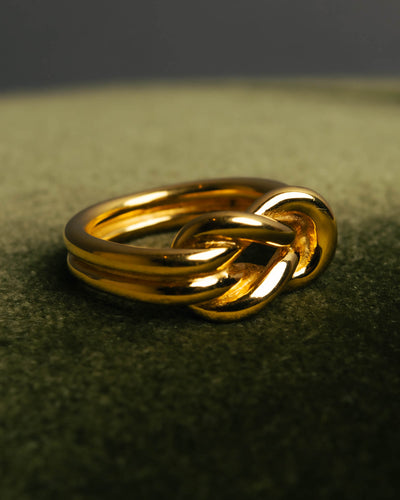 "HERMES" Sculptural gold tone knot Atame scarf ring
