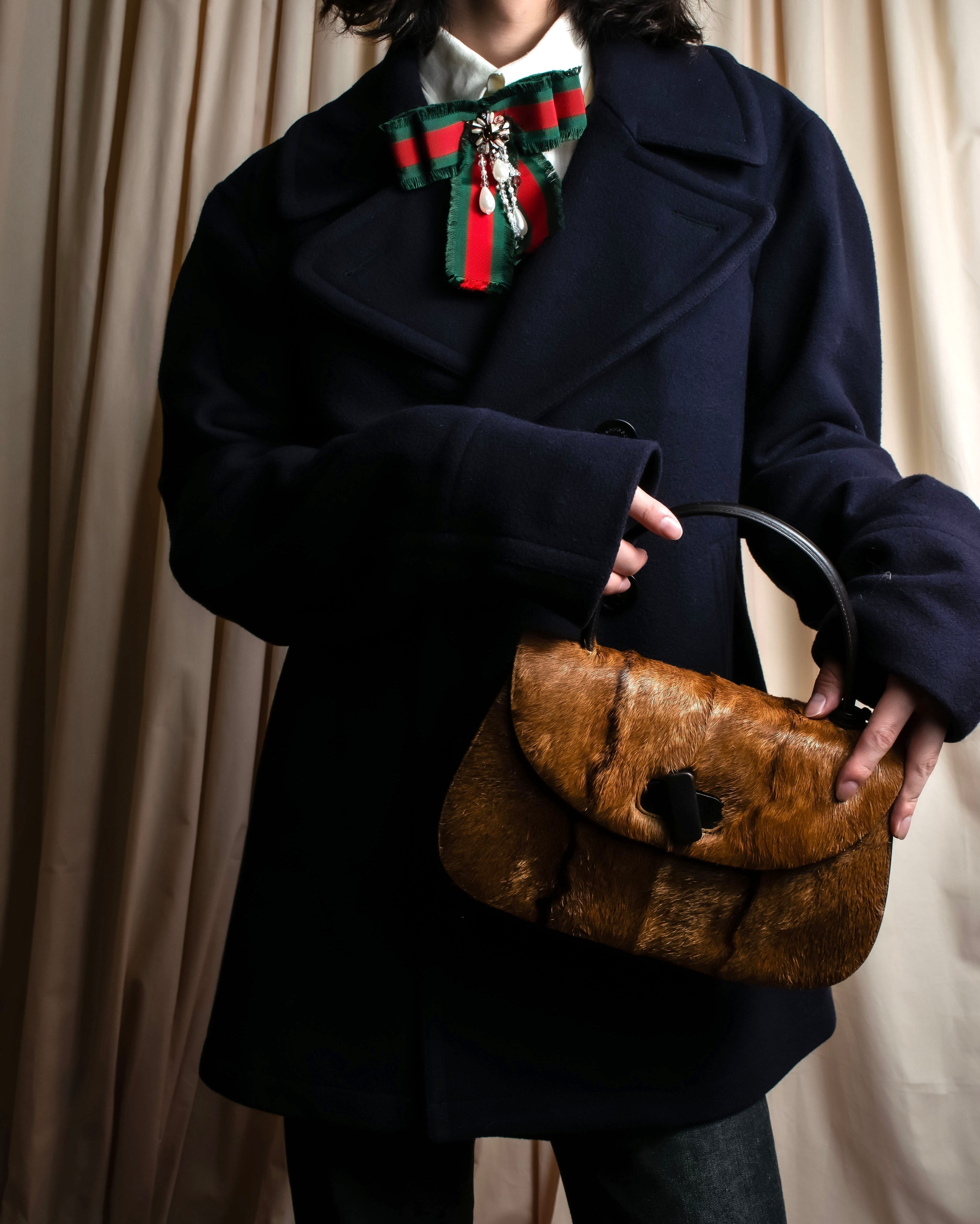 世界を魅了し続ける革と記号の物語 — GUCCIの原点とアイコンたち Part.1