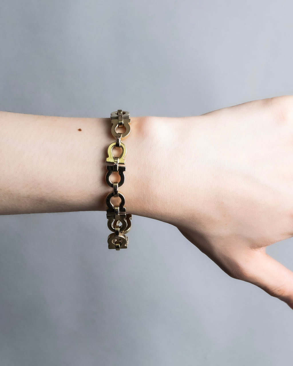 "Ferragamo" Gancini motif gold color bracelet