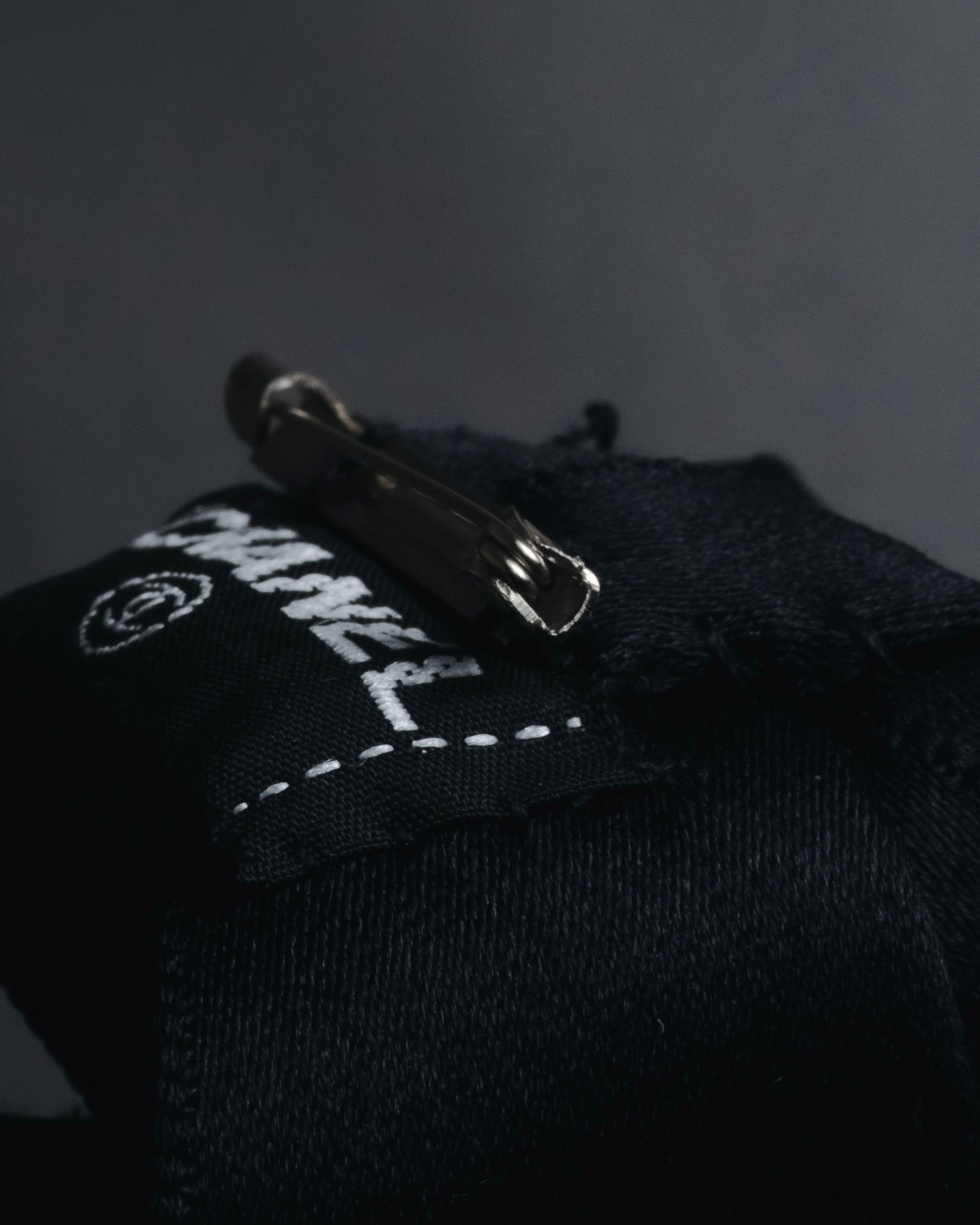 "CHANEL" 90’s black satin and grosgrain ribbon brooch