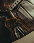 “Yves Saint Laurent” 70’s-80’s Perforated logo leather tassel shoulder bag