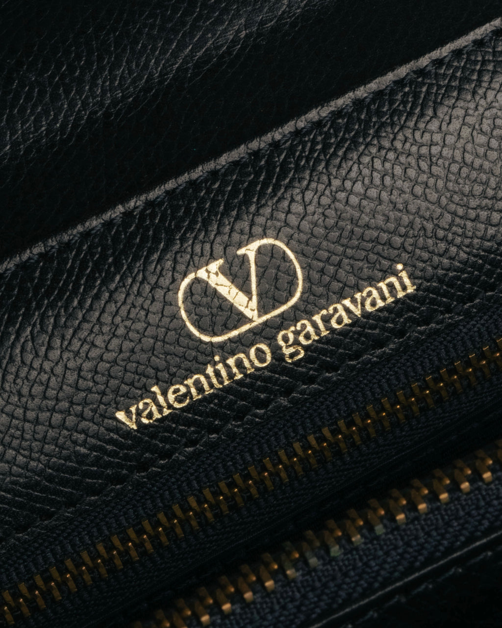“Valentino Garavani” 90’s-00’s Structured V logo leather handbag