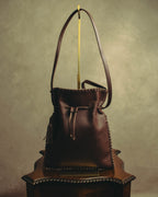 “YVES SAINT LAURENT“ 90’s-00’s Leather drawstring shoulder bag