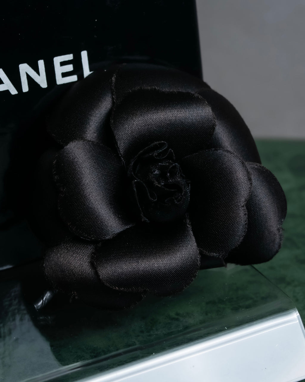 "CHANEL" Black camellia motif brooch