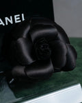 "CHANEL" Black camellia motif brooch