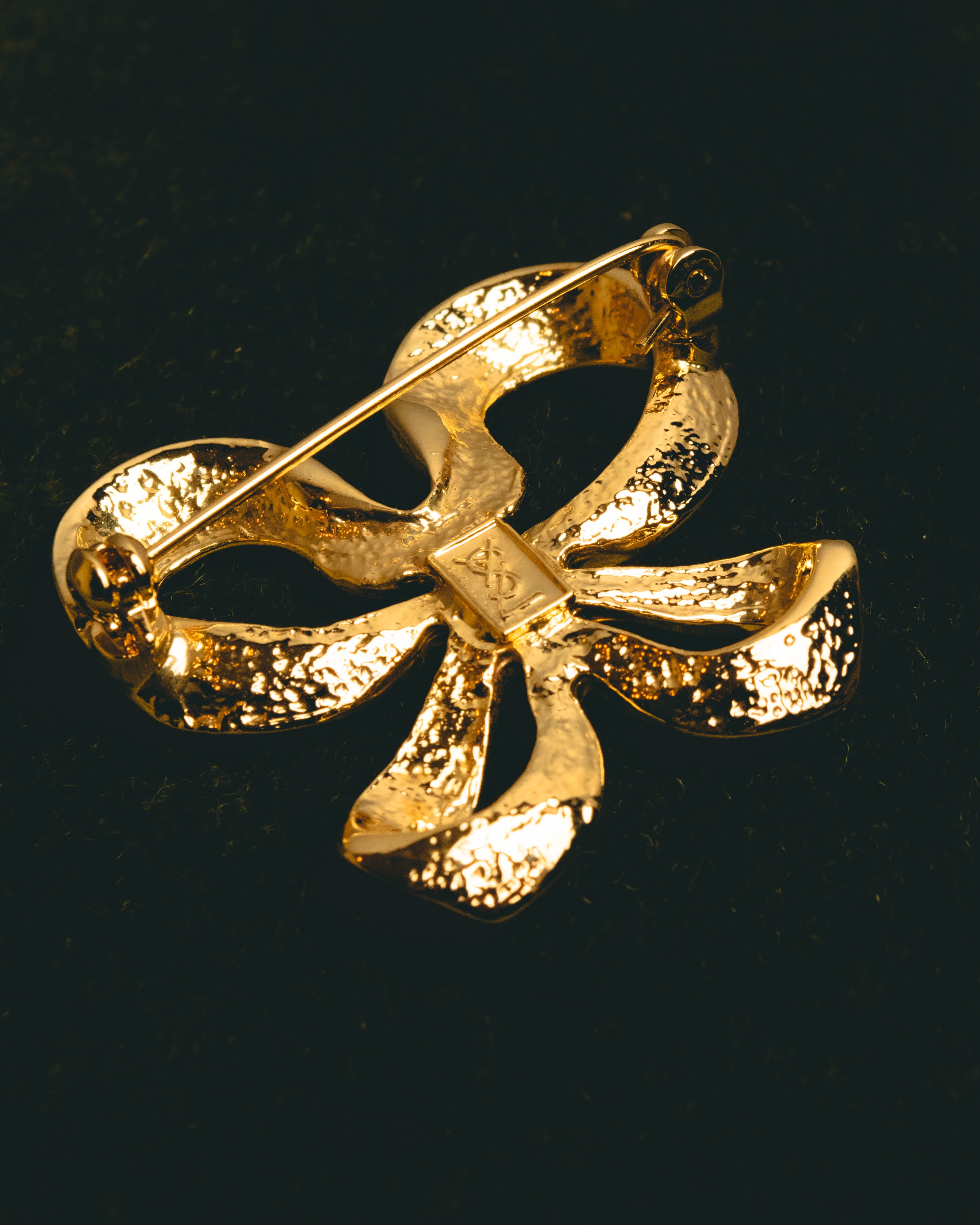 "Yves Saint Laurent" Sculptural gold bow brooch