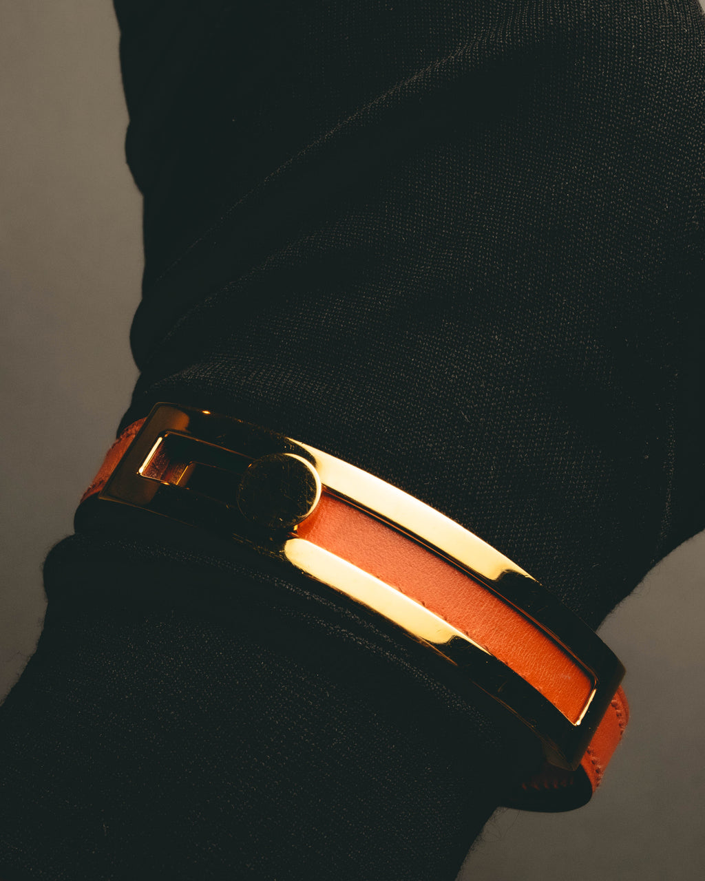 "Hermès" 00's Vibrant orange leather bracelet