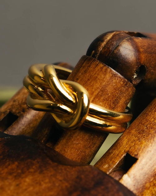 "HERMES" Sculptural gold tone knot Atame scarf ring