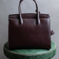 "HAMANO TOKYO" Trapezoidal shape iconic hardware leather one handle bag