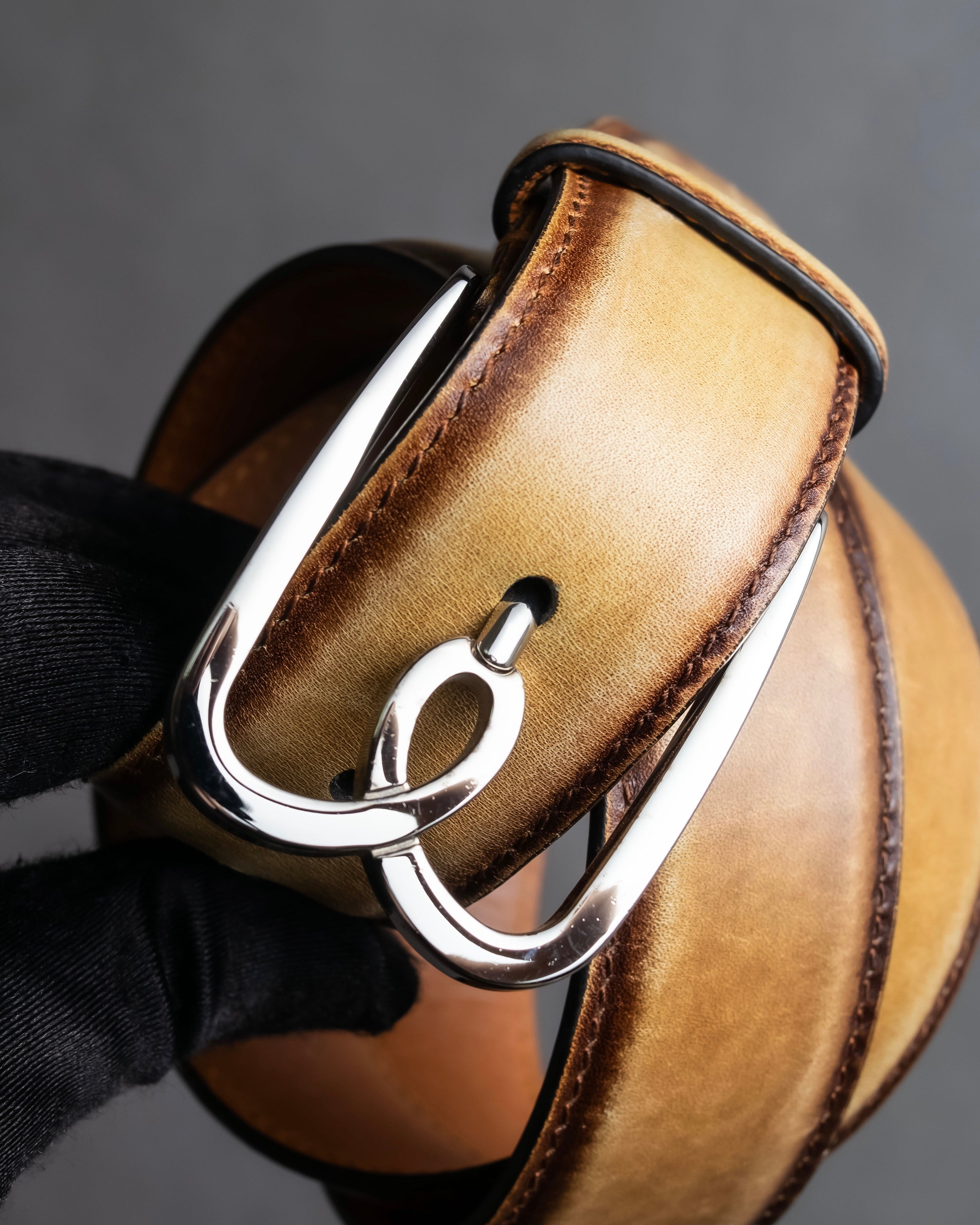 "Berluti" Patina finish curved buckle leather belt