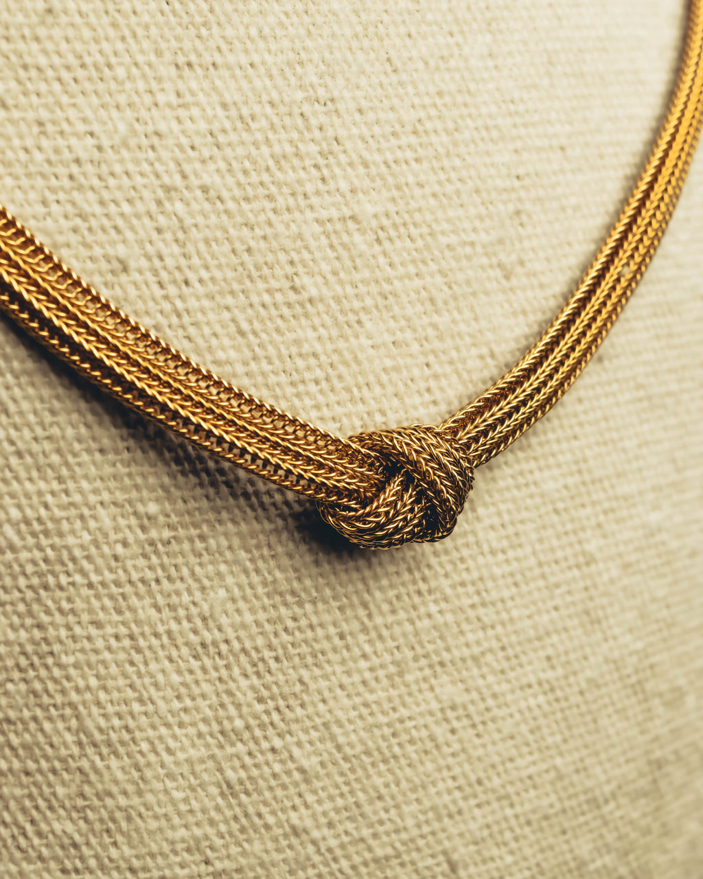 "Christian Dior" Gold tone braided knot costume jewelry necklace