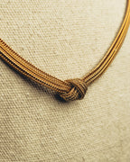 "Christian Dior" Gold tone braided knot costume jewelry necklace