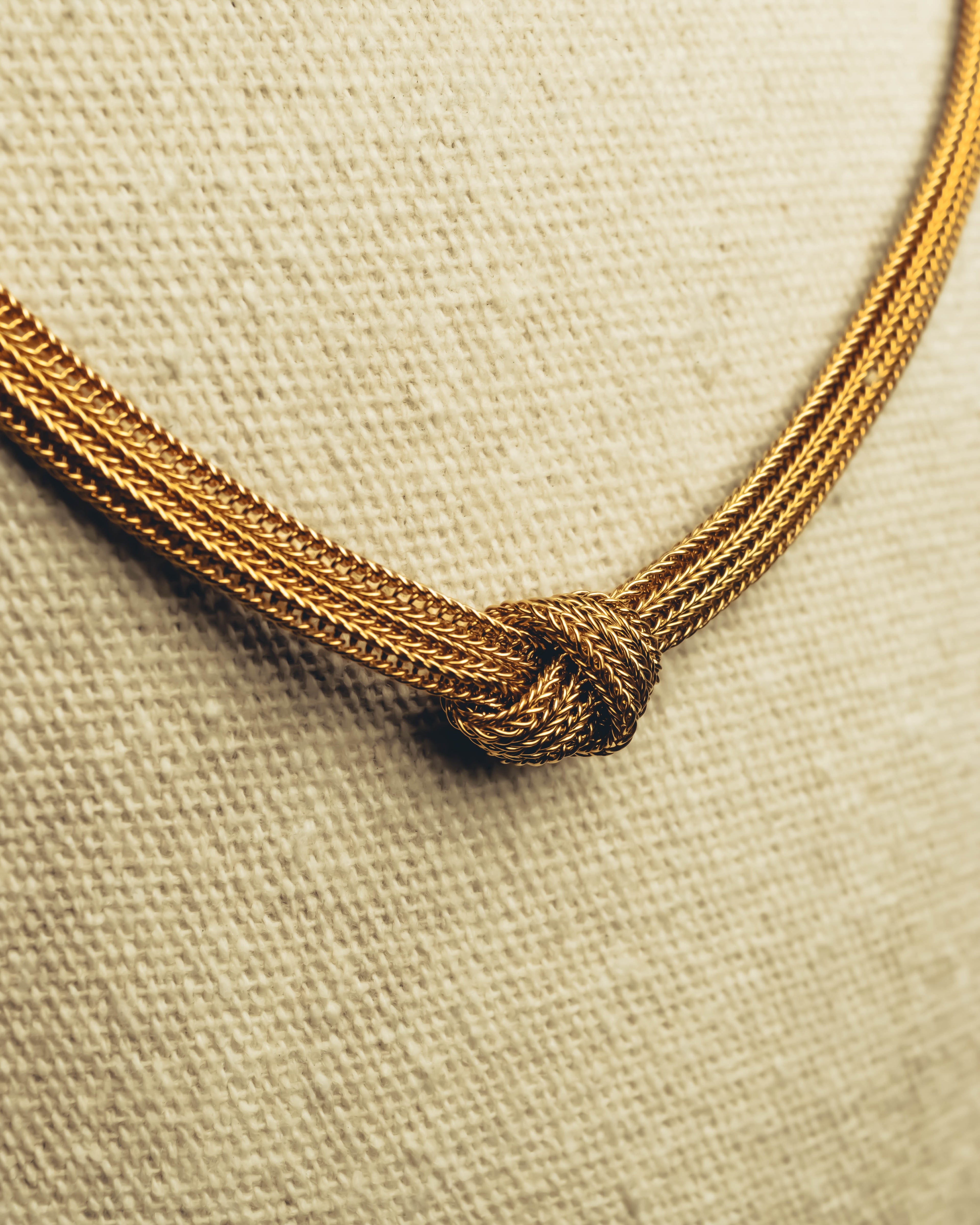 "Christian Dior" Gold tone braided knot costume jewelry necklace