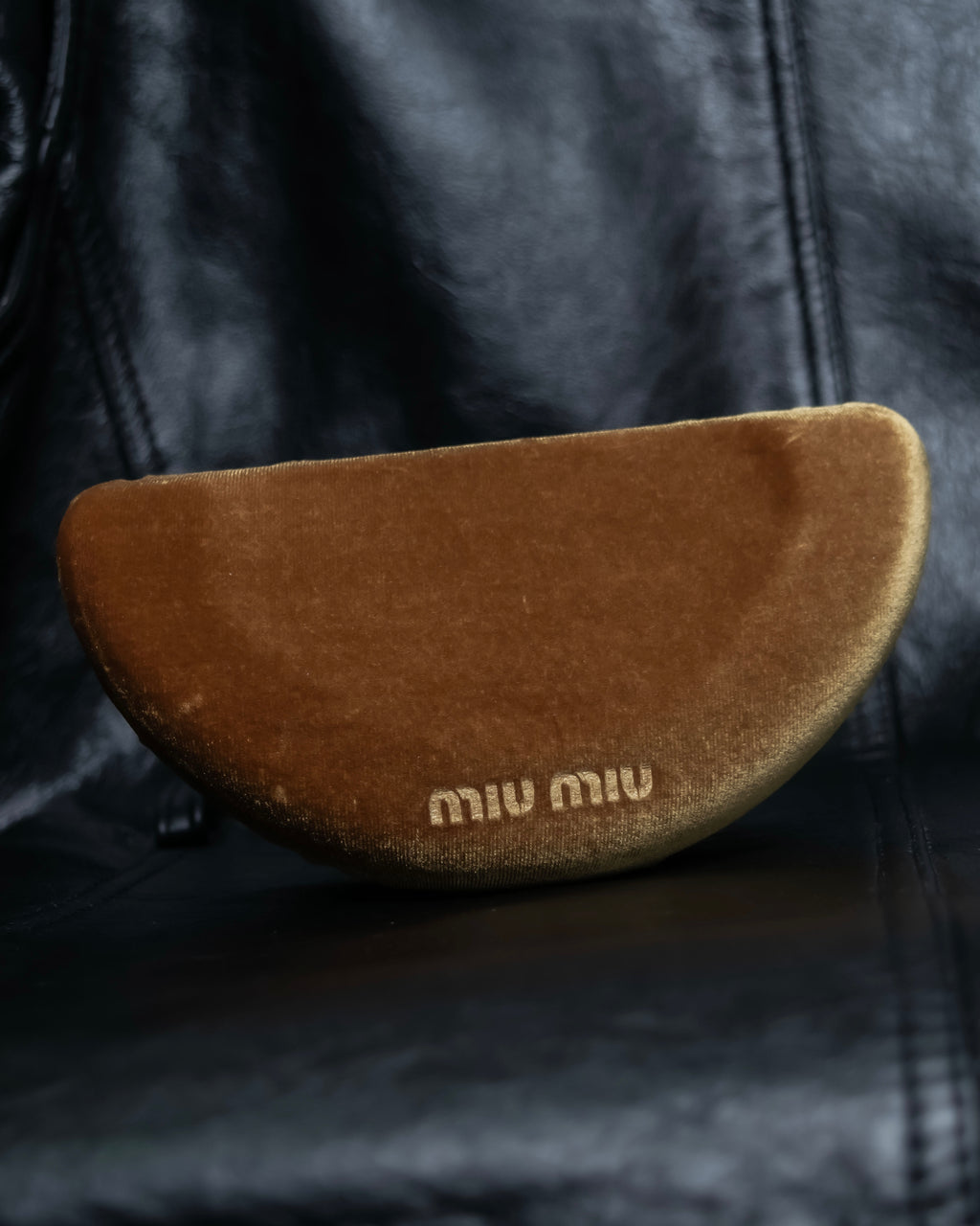 "Miu Miu" reddish brown sporty sunglasses