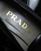 "PRADA" Metal band design leather heel loafers