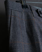 Pantalones vintage con detalle de botones, ventana de estampado a cuadros