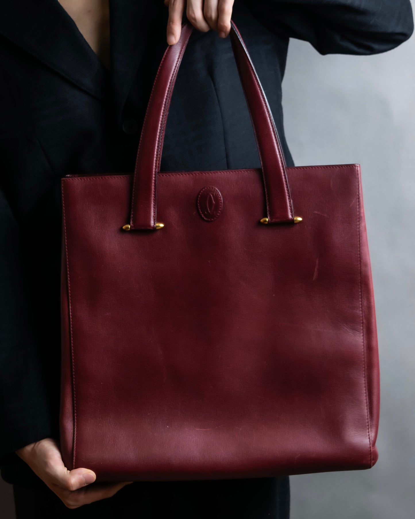 "Cartier" Jewelry ruby color leather tote bag