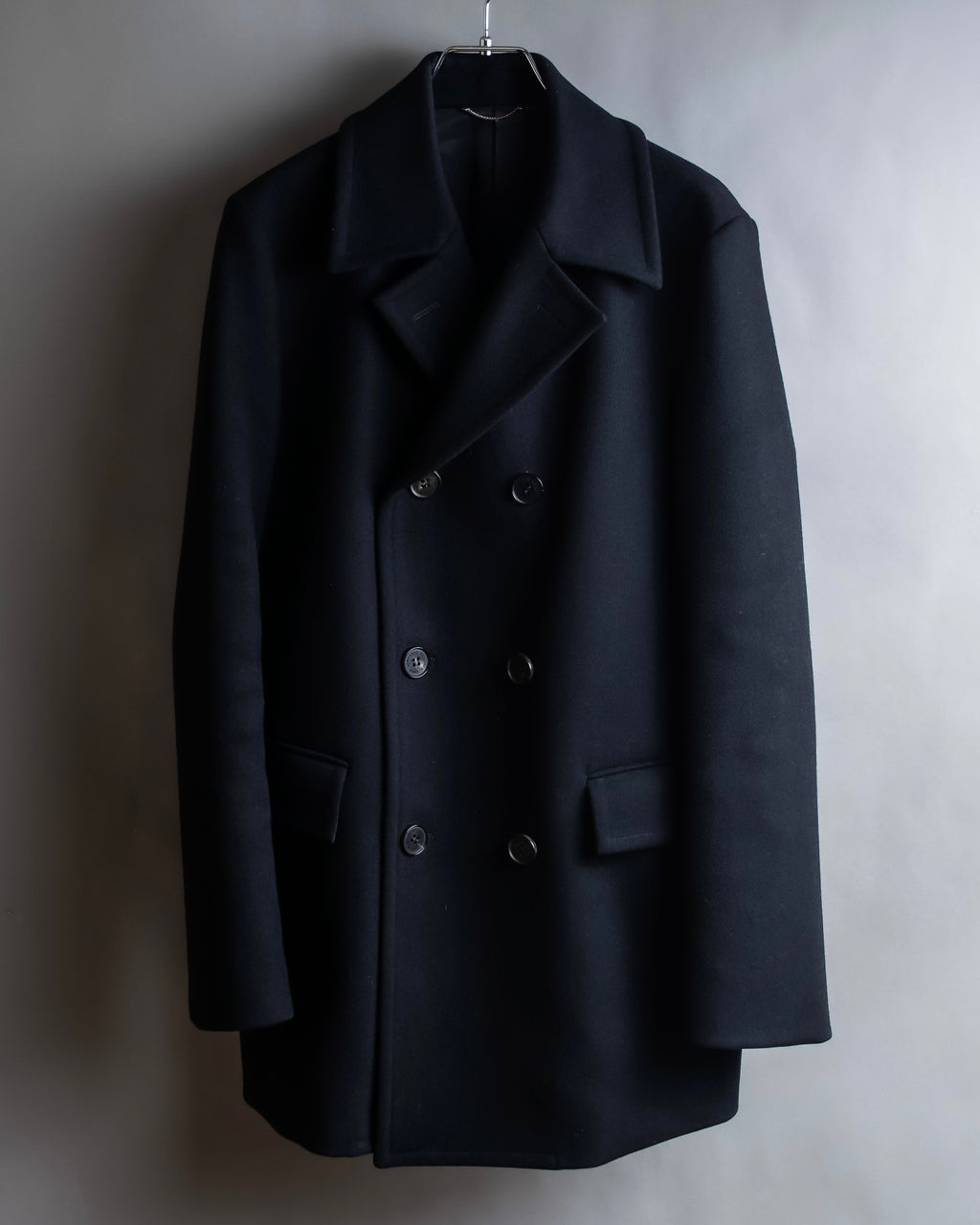 "JOHN LAWRENCE SULLIVAN"
 Large lapel double-breasted mid length coat
