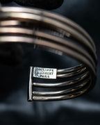 “PHILIPPE AUDIBERT” Crossed 5 line silver bangle