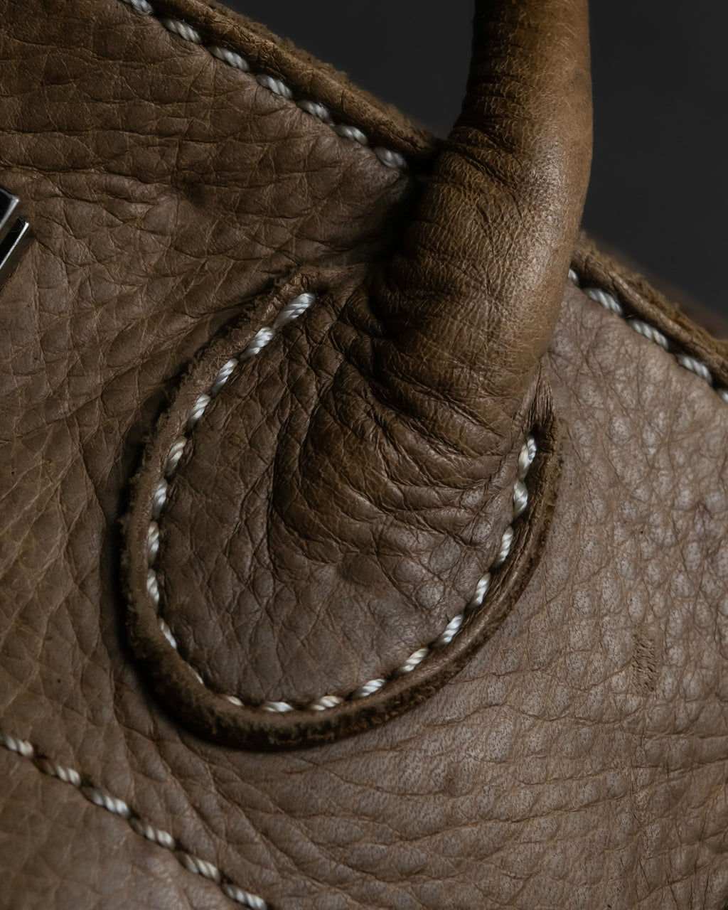 "Mademoiselle Accessories"
 Silver parts design leather one handle bag