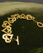 -SPECIAL- “Yves Saint Laurent” 80’s-90’s Hammered gold heart motif bracelet