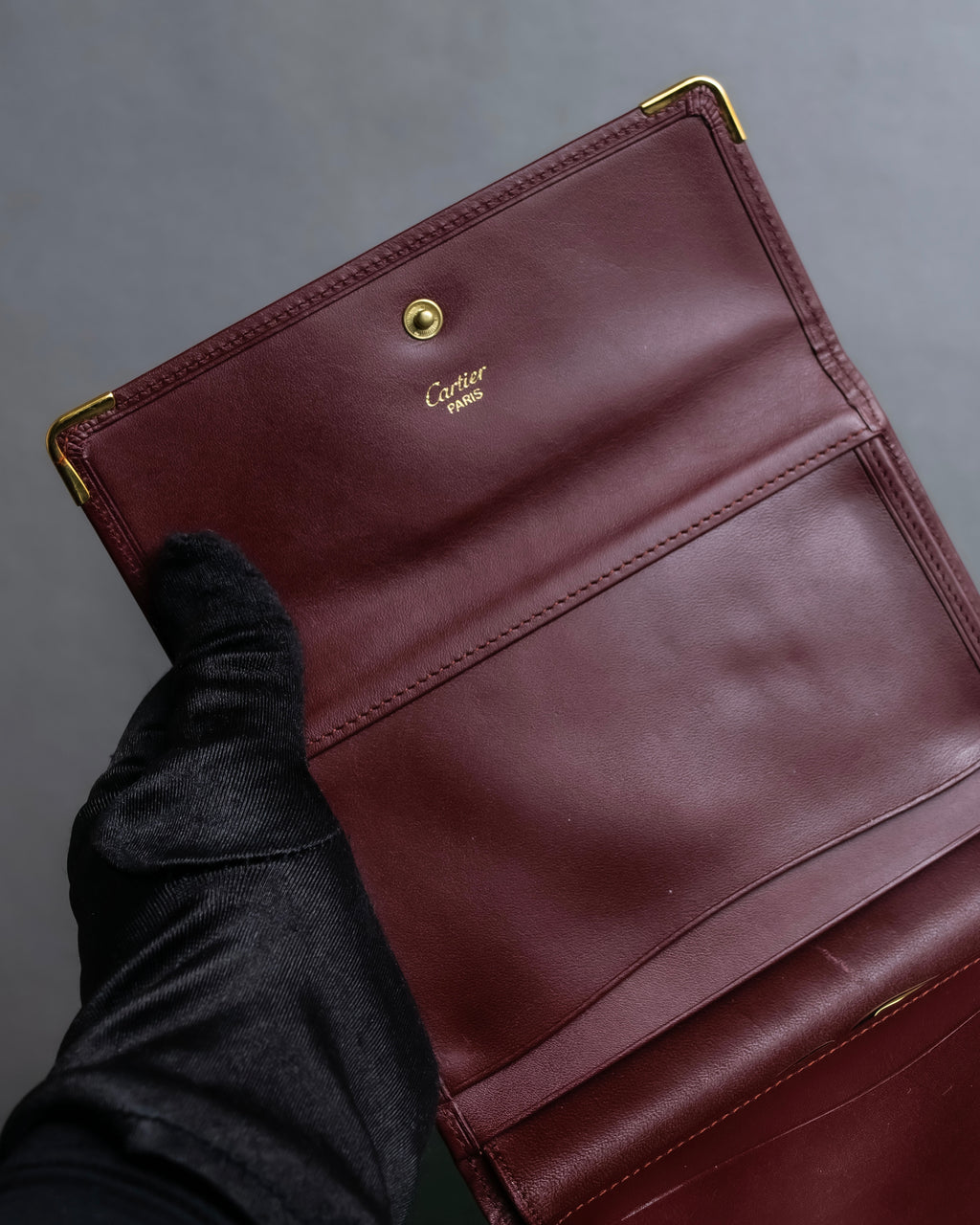 "Cartier" Les Must de Cartier bordeaux color leather wallet