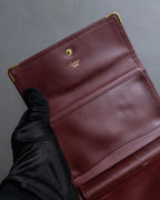 "Cartier" Les Must de Cartier bordeaux color leather wallet