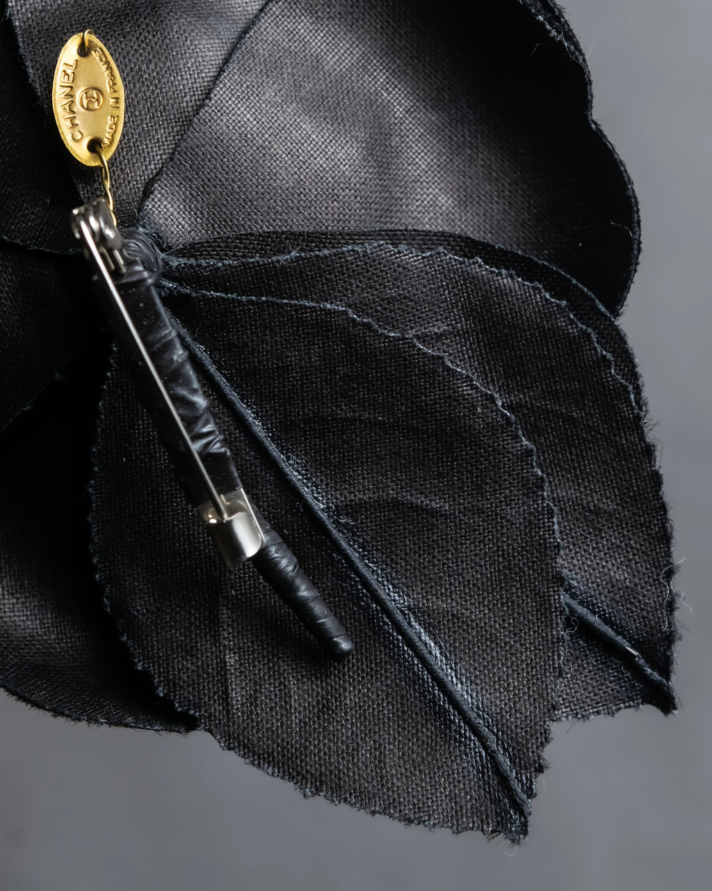 "CHANEL" Black camellia motif brooch