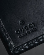"GUCCI" Mid 00’s wood-lock leather long wallet