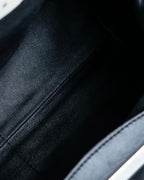 "MARNI" Side ribbon design rounded body leather bag