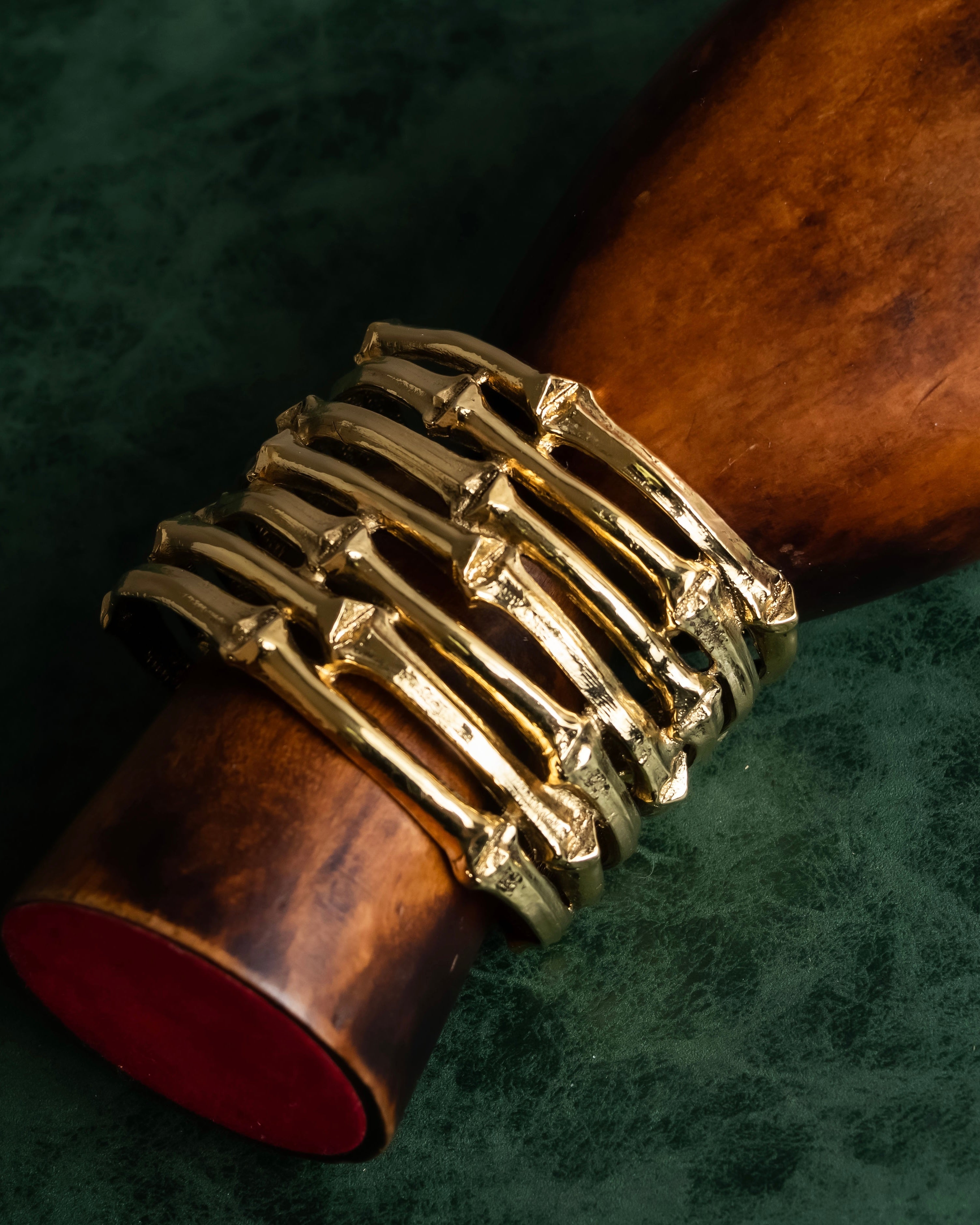 "YVES SAINT LAURENT" Skeletal arm shape design gold bangle
