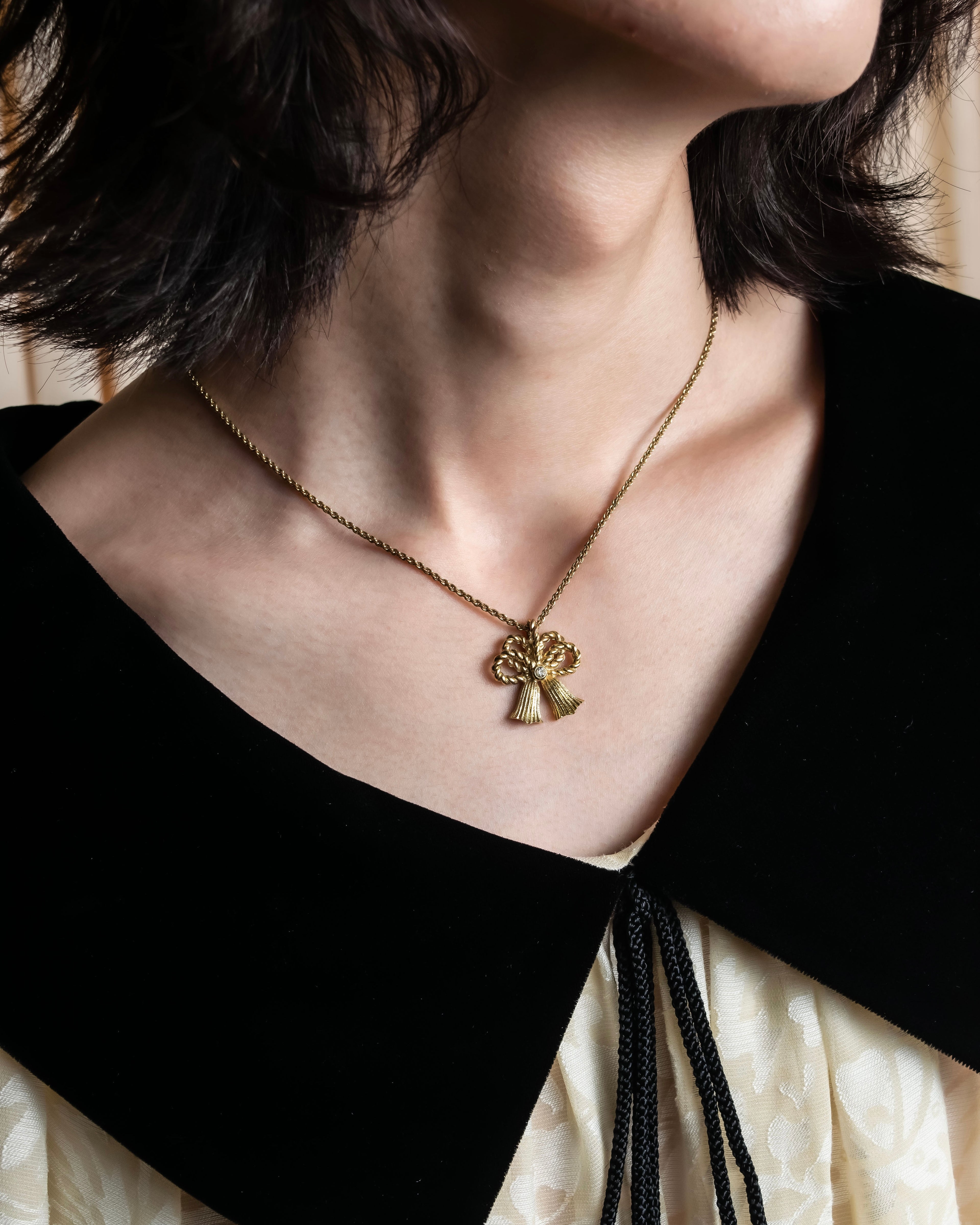 "Christian Dior" Rope ribbon motif gold necklace