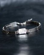 "Guy Laroche" Logo motif silver bracelet