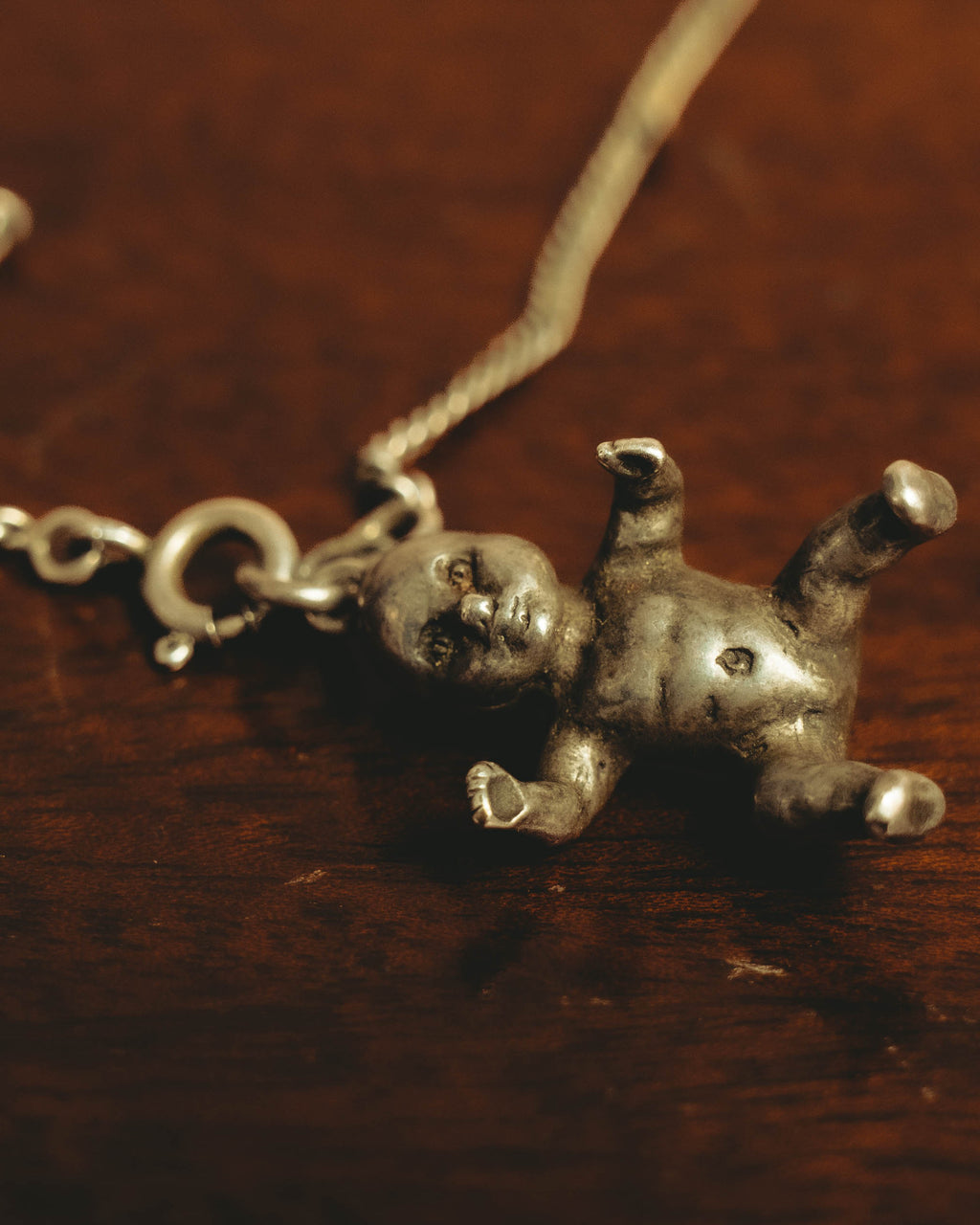 "Saint Laurent" 10's-20's Sculptural doll pendant necklace