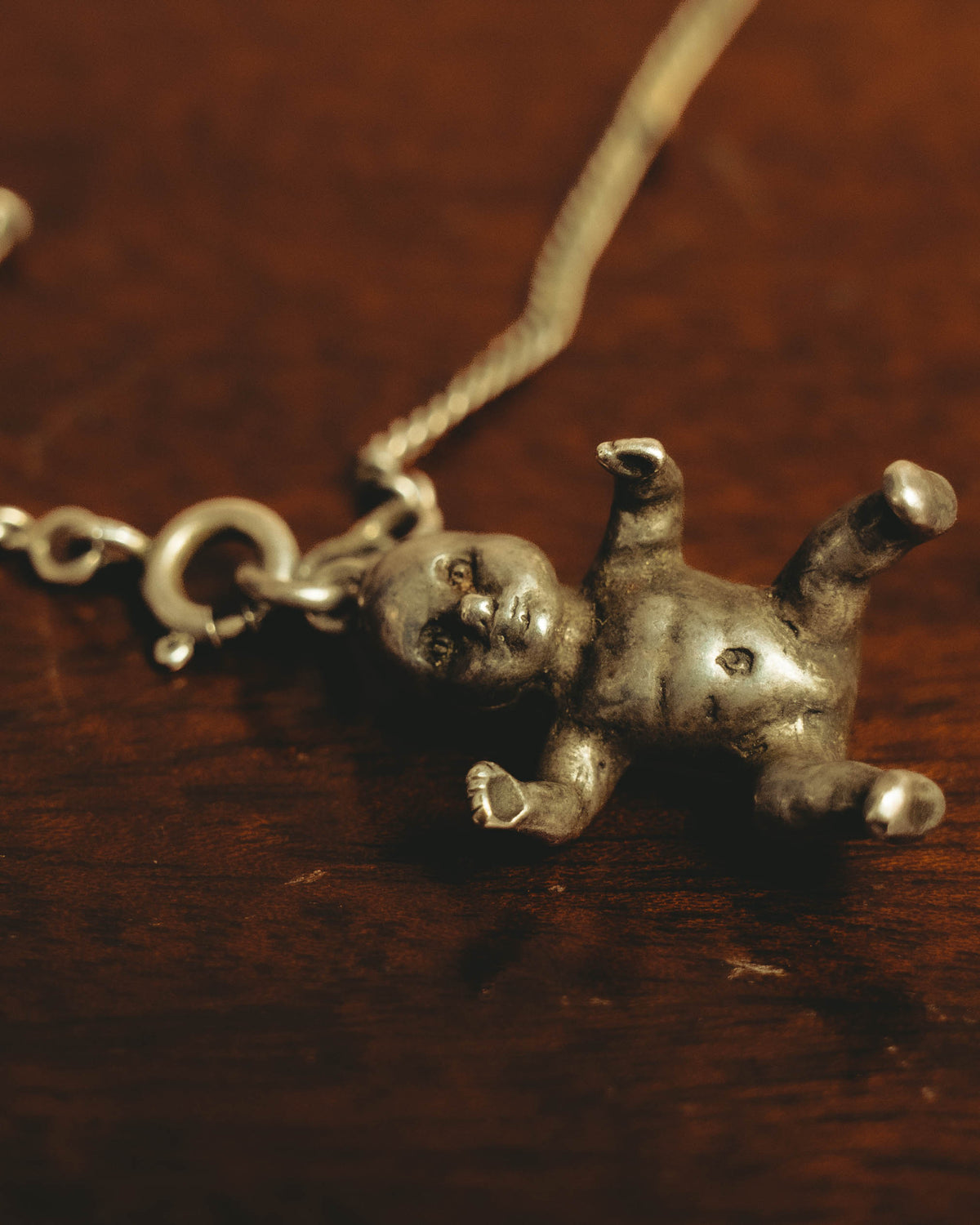 "Saint Laurent" 10's-20's Sculptural doll pendant necklace