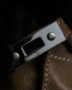 "Mademoiselle Accessories"
 Silver parts design leather one handle bag