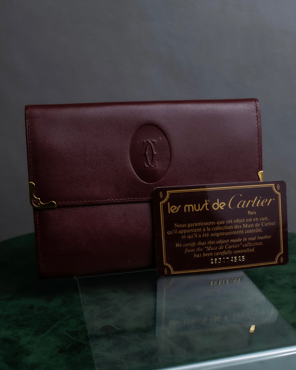 "Cartier" Les Must de Cartier bordeaux color leather wallet