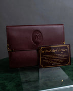 "Cartier" Les Must de Cartier bordeaux color leather wallet