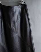 "HARVEY LOGAN" Diagonal cut design lamb leather flare skirt
