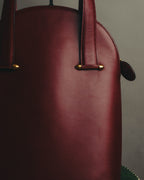 "Cartier" 80's-90's Bordeaux leather handbag
