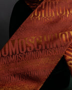 "MOSCHINO" Logo engraved patterned glossy silk necktie