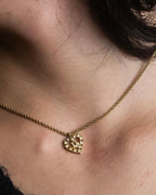 "Christian Dior" Rhinestone studded CD logo design in gold necklace