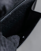 "YVES SAINT LAURENT" Cassandra logo engraved leather bi-fold wallet