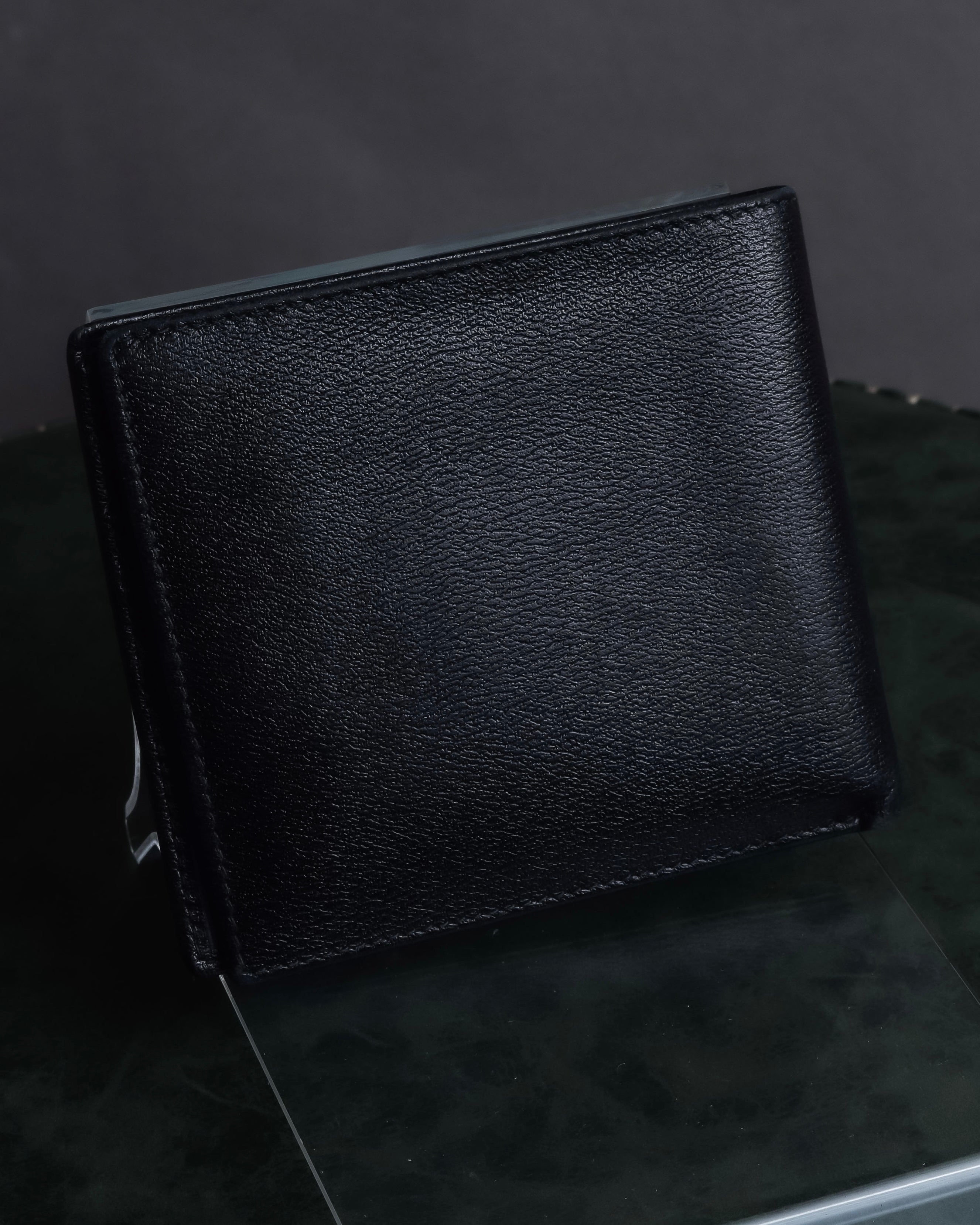 "LOEWE" Logo engraved bi-fold leather wallet