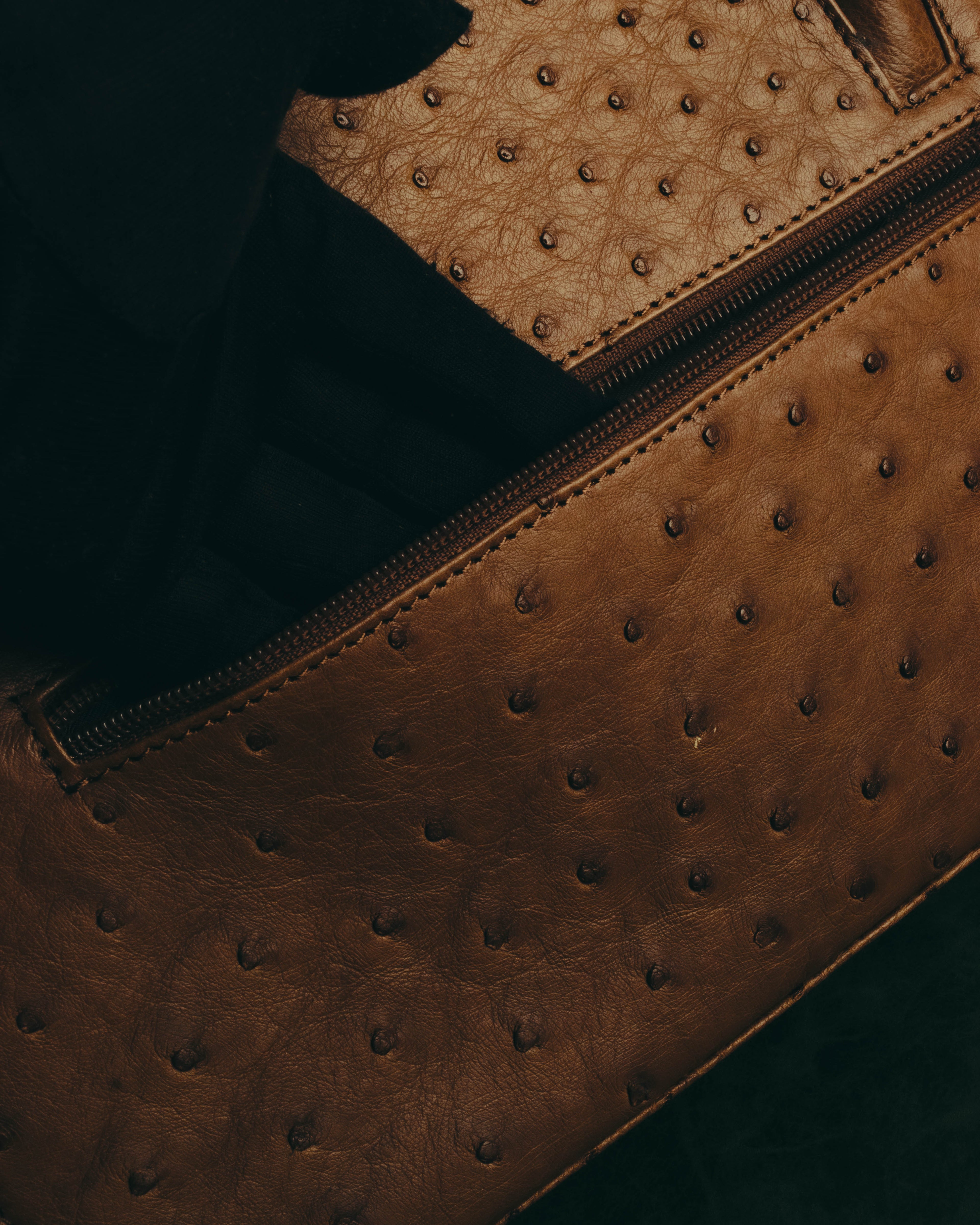 “GIOVANNI VALENTINO” Structured ostrich top handle bag