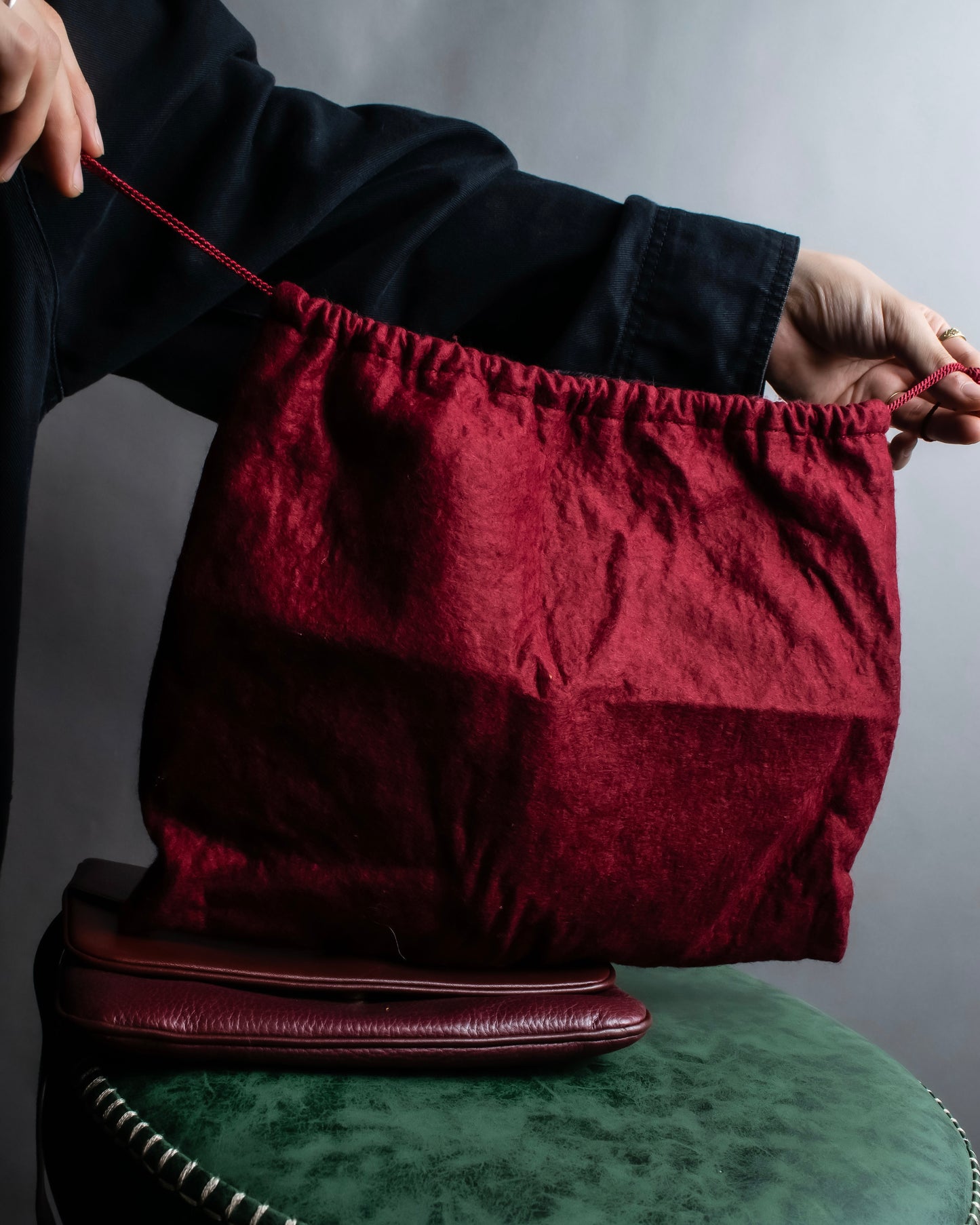 "Cartier" Texture changing bordeaux colored leather shoulder bag