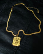 "Yves Saint Laurent" YSL logo plate gold necklace
