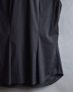 "Yves Saint Laurent Rive Gauche"
Twisted front sleeveless shirt